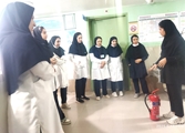 آموزش استفاده از کپسول آتش نشانی به کارکنان بخش های مختلف بیمارستان امام محمدباقر(ع)
